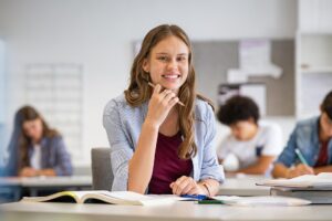 Happy smiling student girl studying in classroom 2021 08 29 11 16 08 utc 1.jpg