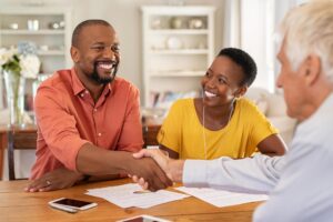 Man shaking hands with insurance agent 2021 08 26 15 34 43 utc 1.jpg